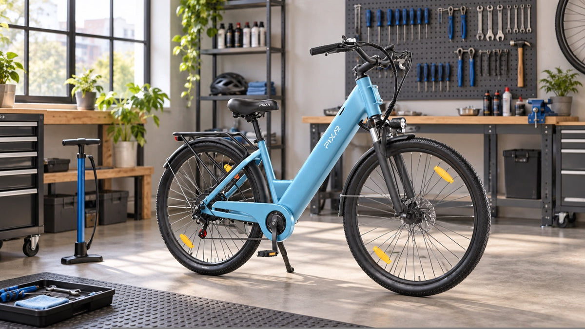 Blue PIXAR C1 electric bike in a clean workshop ready for inspection